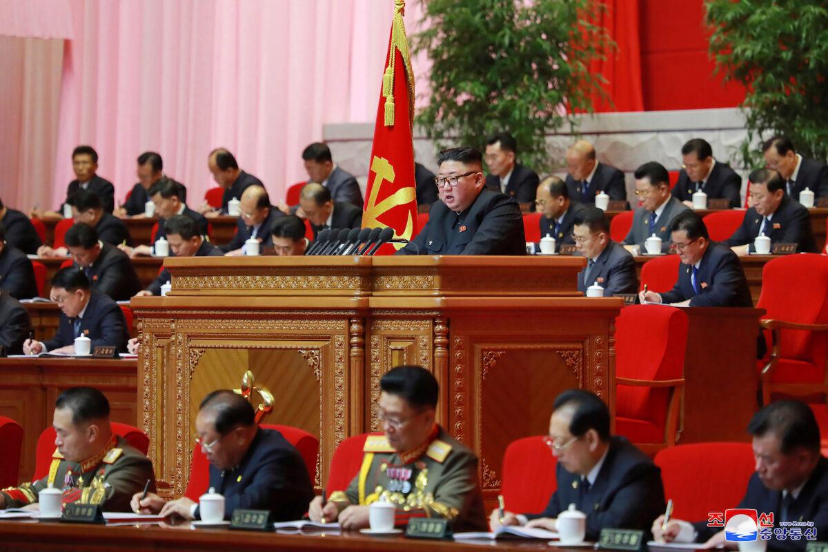 In this photo provided by the North Korean government, North Korean leader Kim Jong Un, center, attends a ruling party congress in Pyongyang, North Korea on Jan. 6, 2021. (Korean Central News Agency/Korea News Service via AP)