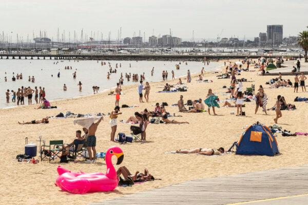People enjoy the weather at St Kilda beach in Melbourne, Australia on Nov. 27, 2020. (Daniel Pockett/Getty Images)