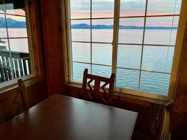 The dining area of a Zephyr Point Cabin on the Nevada side offers spectacular views of Lake Tahoe. (Courtesy of Margot Black)