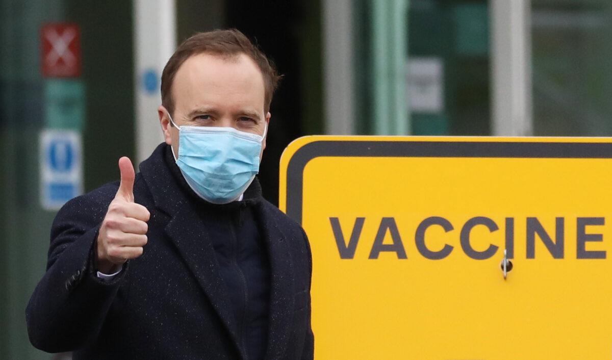 Matt Hancock, Secretary of State for Health, visits the NHS vaccine centre that has been set up at Epsom Racecourse in Epsom, England, on Jan. 11, 2021. (Dan Kitwood/Getty Images)
