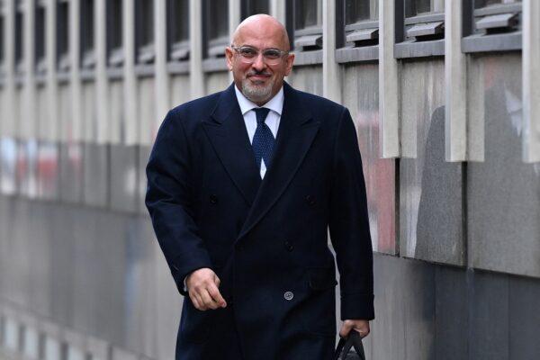 Britain's Parliamentary Under Secretary of State at the Department of Health and Social Care, Nadhim Zahawi, who has responsibility for the deployment of COVID-19 vaccines, reacts as he walks along a street in Westminster in London on Dec. 2, 2020. (Justin Tallis/AFP via Getty Images)