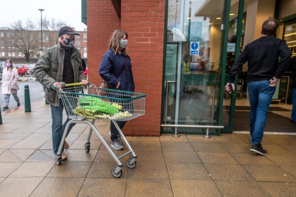 Shoppers outside a branch of Morrisons on Dec. 21, 2020 in Portsmouth, United Kingdom. (Andrew Hasson/Getty Images)