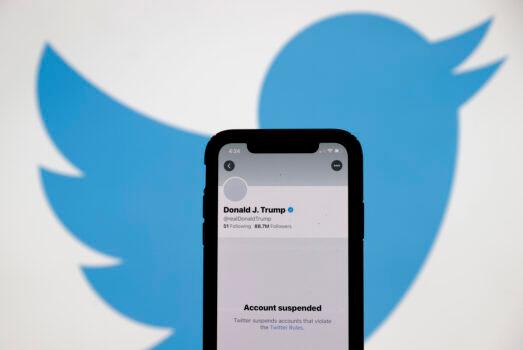 The suspended Twitter account of U.S. President Donald Trump appears on an iPhone screen on Jan. 08, 2021. (Justin Sullivan/Getty Images)