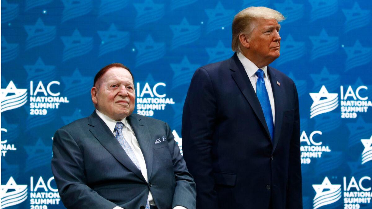 President Donald Trump stands alongside Las Vegas Sands Corporation Chief Executive and Republican mega donor Sheldon Adelson before speaking at the Israeli American Council National Summit in Hollywood, Fla., on Dec. 7, 2019. (Patrick Semansky/AP Photo)