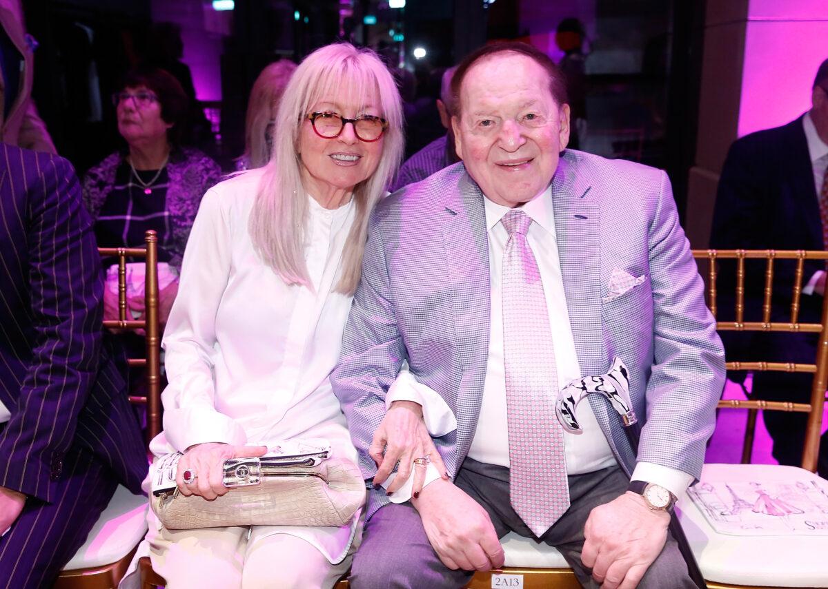 U.S. billionaire Sheldon Adelson (R) and wife Miriam Adelson attend the Swarovski show during the Front Row at Shoppes at Parisian in Macau on Sept. 14, 2016. (Anthony Kwan/Getty Images)