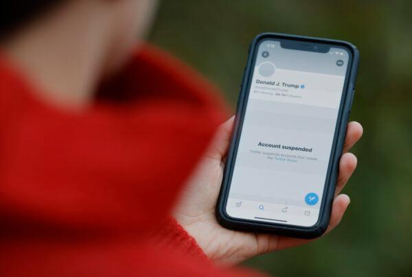 The suspended Twitter account of U.S. President Donald Trump appears on an iPhone screen in San Anselmo, Calif., on Jan. 8, 2021. (Justin Sullivan/Getty Images)