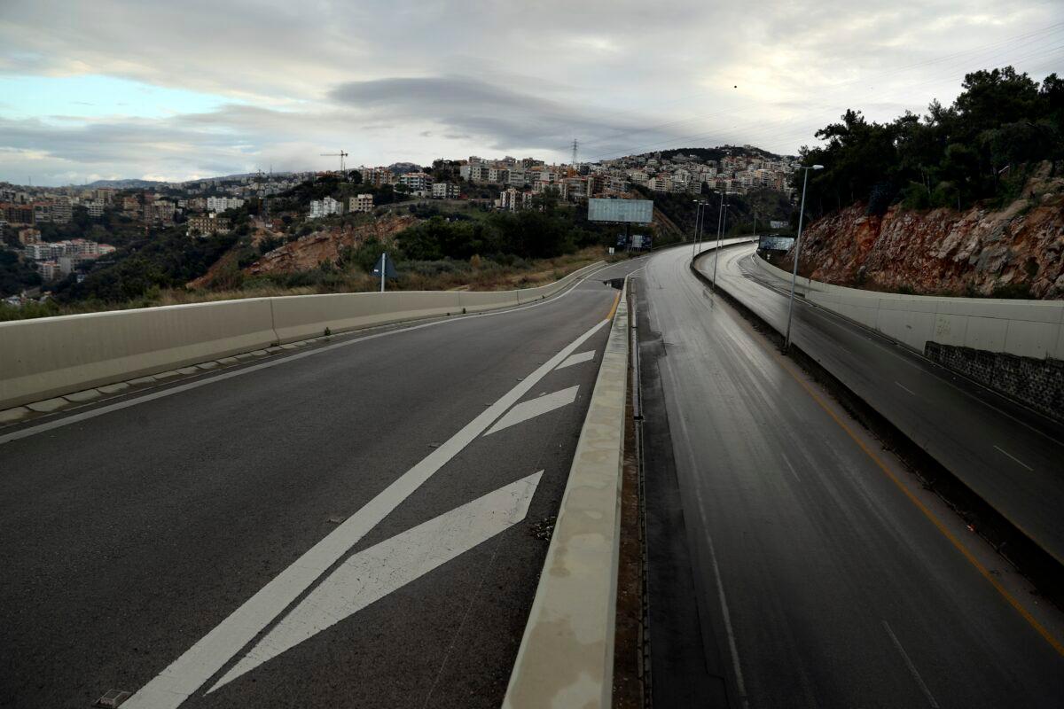 A highway is empty during a lockdown aimed at curbing the spread of the coronavirus, in the Beirut suburb of Roumieh, Lebanon, on Jan. 14, 2021 (Bilal Hussein/AP Photo)