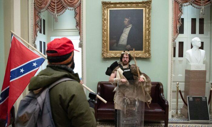 Fur-Donning Protestor, Son of Prominent NY Judge, Arrested and Banned From All Capitals