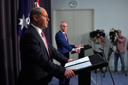 Treasurer Josh Frydenberg and Minister for Communications Paul Fletcher address media during a press conference in the Blue Room at Parliament House on Dec. 8, 2020 in Canberra, Australia. (Sam Mooy/Getty Images)