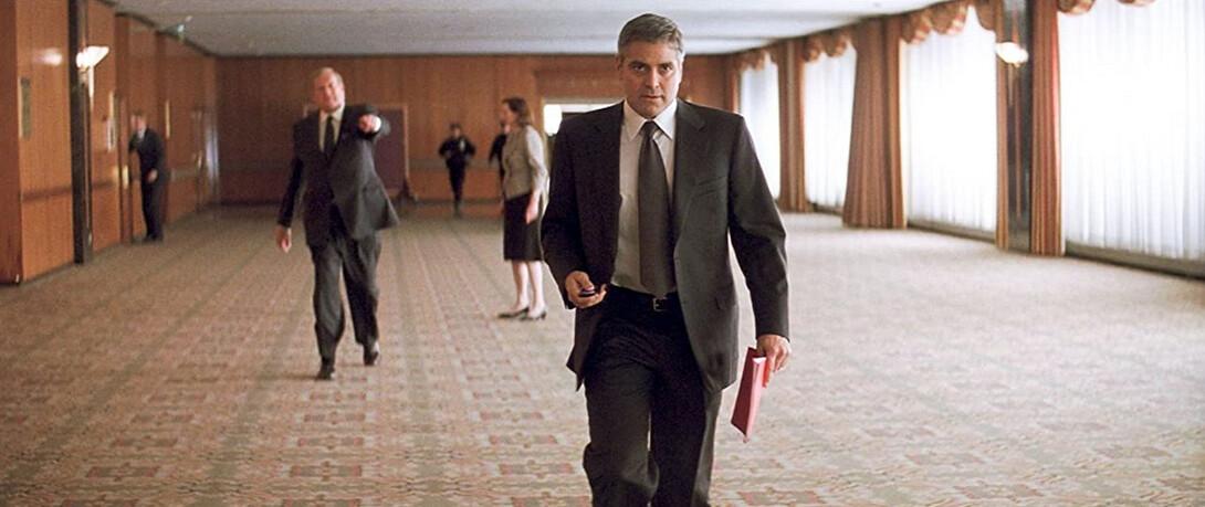 The U-North CEO (Ken Howard, L) shouts for Michael Clayton (George Clooney) to stop, in "Michael Clayton." (Warner Bros.)