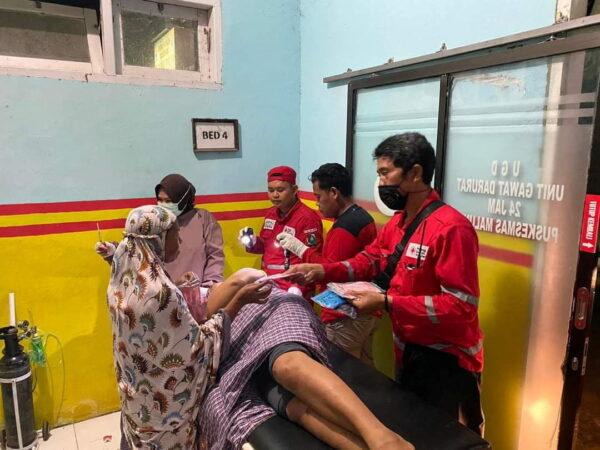 An injured person is taken care of following an earthquake in Mamuju, West Sulawesi, Indonesia, on Jan. 15, 2020. (Palang Merah Indonesia/via Reuters)