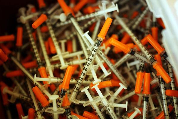 Used syringes are discarded at a needle exchange clinic where users can pick up new syringes and other clean items for those dependent on heroin in St. Johnsbury, Vt., on Feb. 6, 2014. (Spencer Platt/Getty Images)