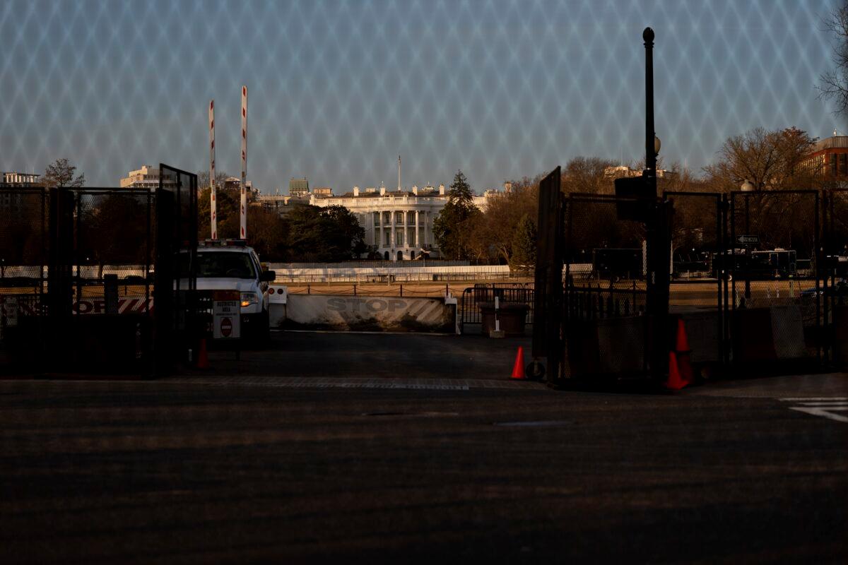 Security fencing surrounds the White House in Washington on Jan. 14, 2021. (Stefani Reynolds/Getty Images)