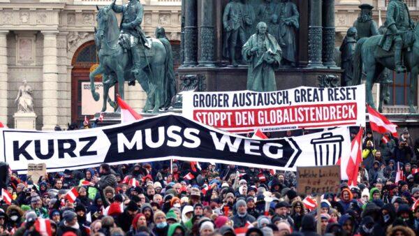 Protestors hold a banner reading ''Kurz must go'' at Maria Theresien Platz during a demonstration against COVID-19 measures and their economic consequences in Vienna, Austria on Jan. 16, 2021. (Lisi Niesner/Reuters)