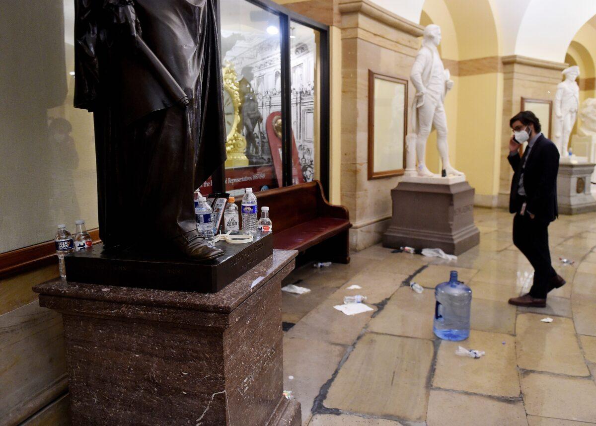 Damage is seen inside the U.S. Capitol building in Washington early on Jan. 7, 2021. (Olivier Douliery/AFP via Getty Images)