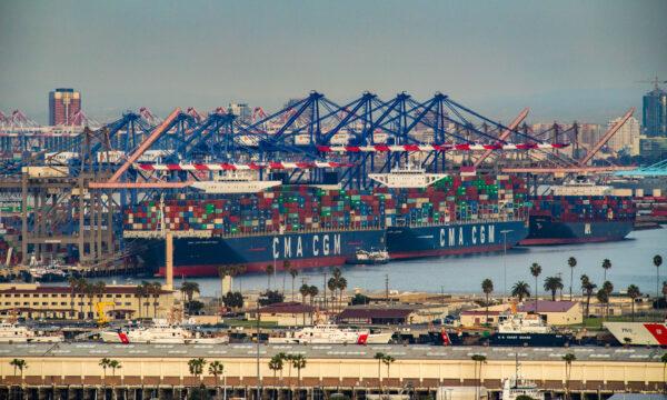 Ships are loaded with cargo at the Port of Los Angeles on Jan. 12, 2021. (John Fredricks/The Epoch Times)