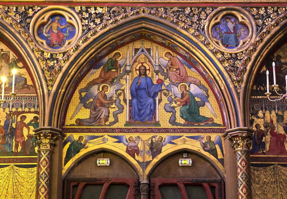Rich paintings and carvings full of Christian symbology cover the walls of Sainte-Chapelle. (Isogood_patrick//Shutterstock.com)