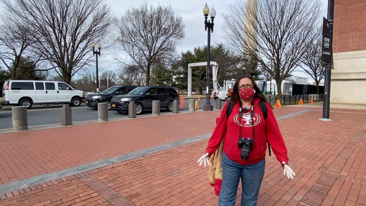 Lorraine Torres from northern Virginia believes the lockdown is necessary but finds it “overwhelming” and “upsetting” in Washington on Jan. 17, 2021. (Terri Wu/The Epoch Times)