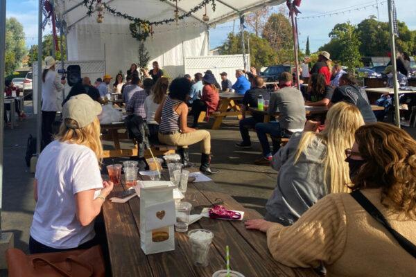 Small-business owners gather to discuss ways to stay open outside the Pineapple Hill Saloon & Grill in Sherman Oaks, Calif., on Jan. 7, 2021. (Jamie Joseph/The Epoch Times)