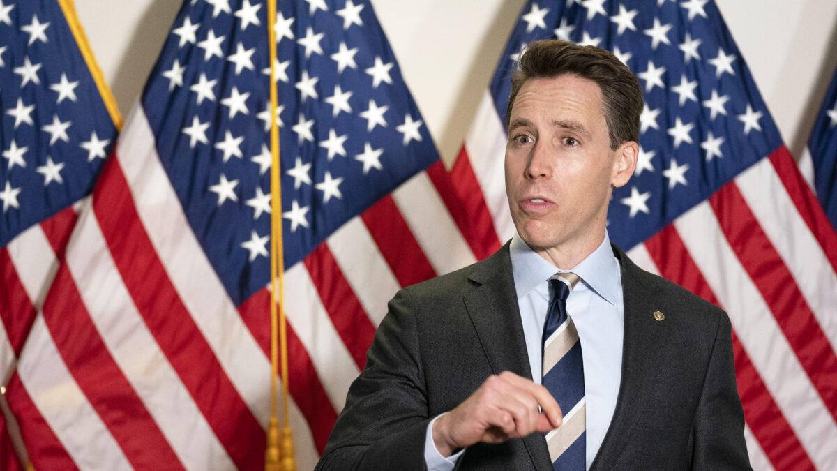 Sen. Josh Hawley (R-Mo.) speaks to reporters as he arrives to the weekly Senate Republican policy luncheon on Capitol Hill in Washington on Oct. 20, 2020. (Stefani Reynolds/Getty Images)