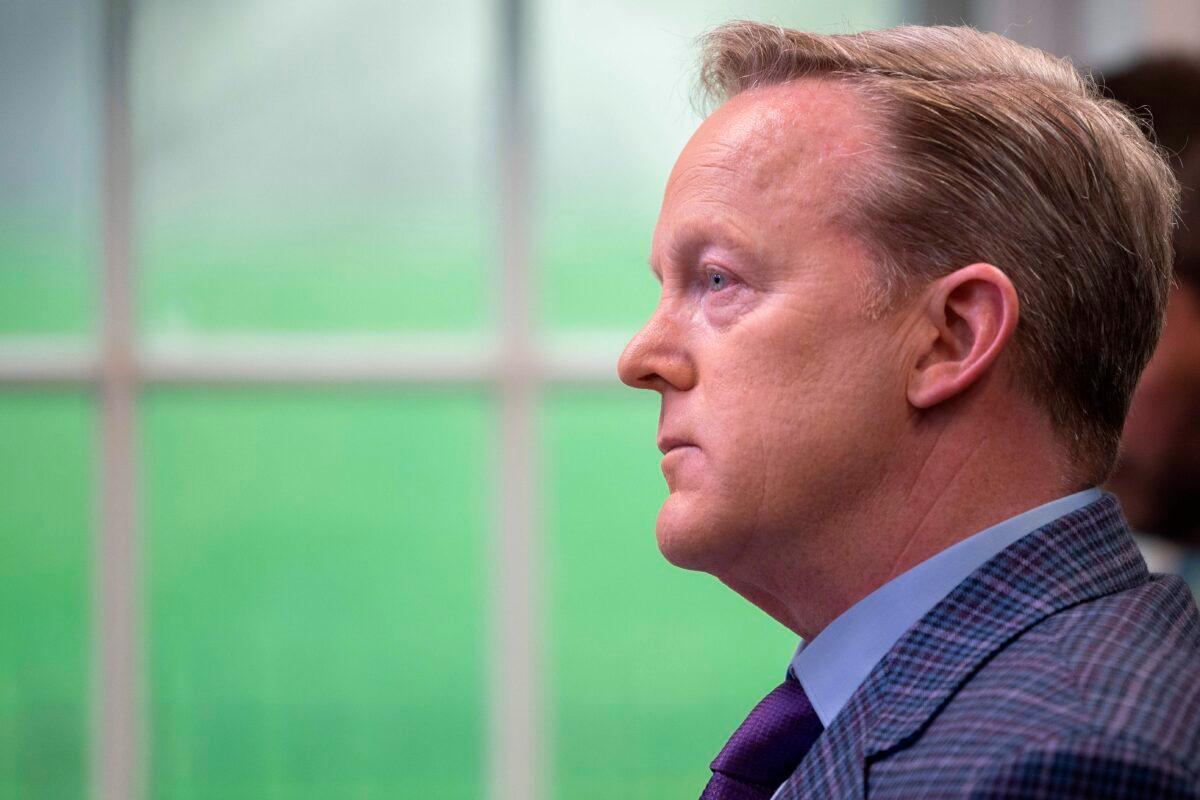 Newsmax reporter Sean Spicer is seen at the White House in Washington on March 20, 2020. (Jim Watson/AFP via Getty Images)