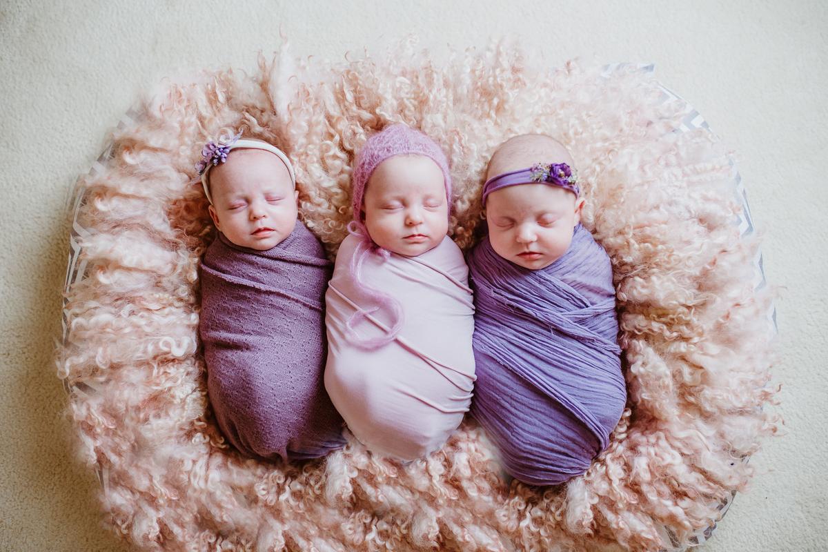 Triplets Liliana, Charlotte, and Isabella. (Kylie Williams Photography/Caters News)