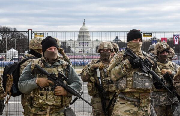 Members of the National Guard patrol the National Mall in Washington on Jan. 19, 2021. (Stephanie Keith/Getty Images)