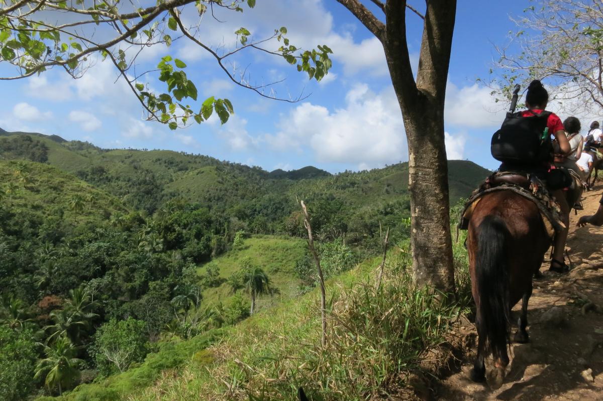 The view of the low-lying mountains along an equestrian trail to visit the waterfall El Limón. (Kevin Revolinski)