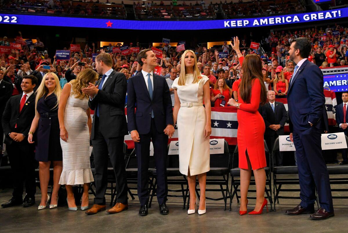 (L-R) Michael Boulos, Tiffany Trump, Lara Trump, Eric Trump, Jared Kushner, Ivanka Trump, Kimberly Guilfoyle, and Donald Trump Jr. arrive at a rally for U.S. President Donald Trump, to officially launch the Trump 2020 campaign, at the Amway Center in Orlando, Florida on June 18, 2019. (Mandel Ngan/AFP via Getty Images)