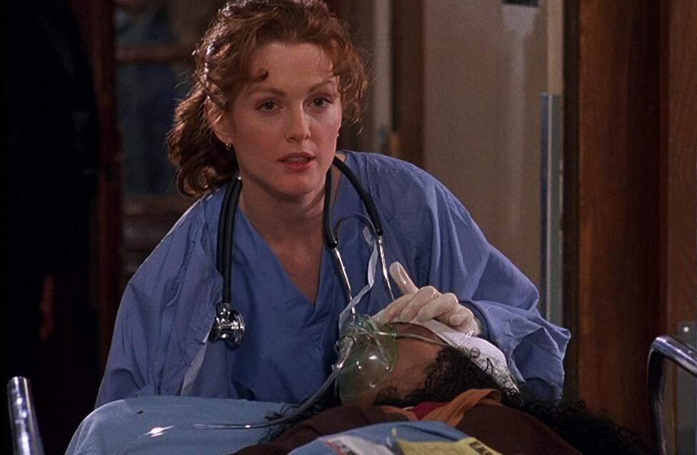 Dr. Anne Eastman (Julianne Moore) is on to Dr. Kimble sneaking around her hospital, in “The Fugitive.” (Warner Bros.)