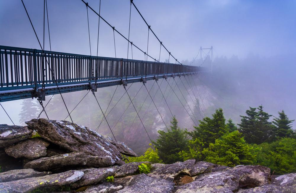 The Mile High Swinging Bridge in fog at Grandfather Mountain. (Jon Bilous/Shutterstock)