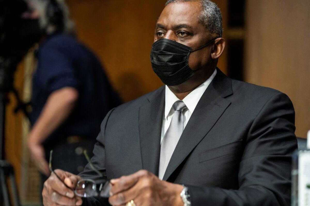 Retired Gen. Lloyd Austin prepares to testify before the Senate Armed Services Committee during his confirmation hearing to be the next secretary of defense, in Washington on Jan. 19, 2021. (Jim Lo Scalzo/Pool via Reuters)