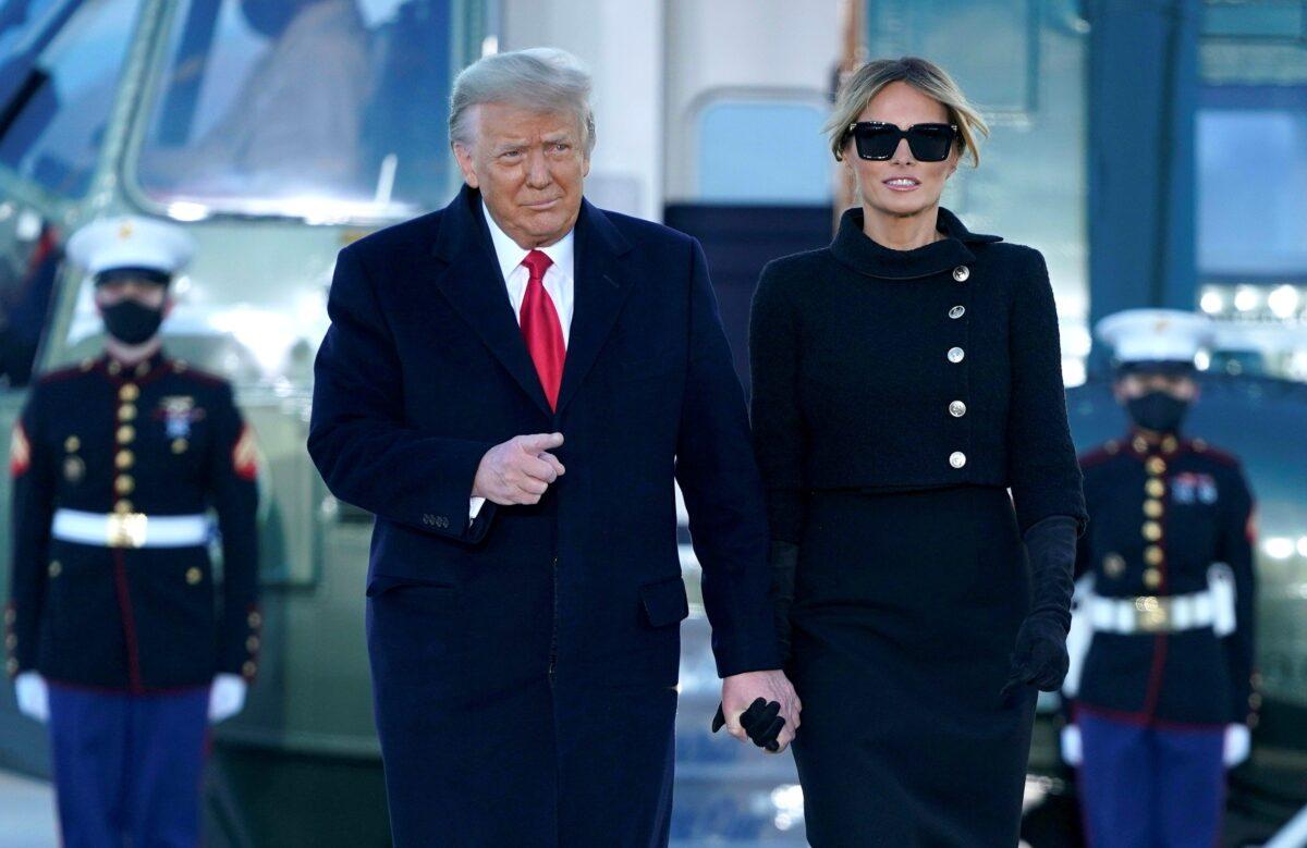 President Donald Trump and First Lady Melania Trump descend Marine One at Joint Base Andrews in Md., on Jan. 20, 2021. (Alex Edelman/AFP via Getty Images)
