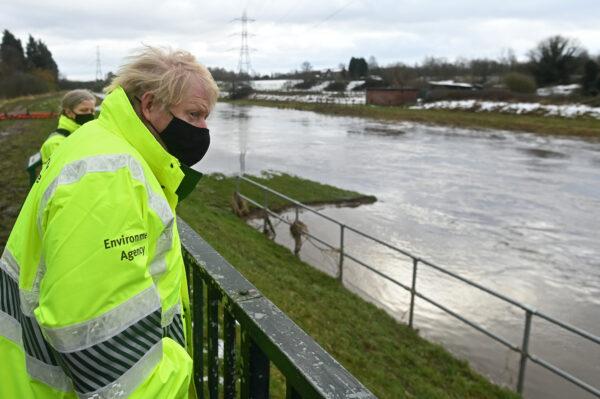 Prime Minister Boris Johnson visits a storm basin near the River Mersey in Didsbury, Manchester, England on Jan. 21, 2021. (Paul Ellis - WPA Pool/Getty Images)