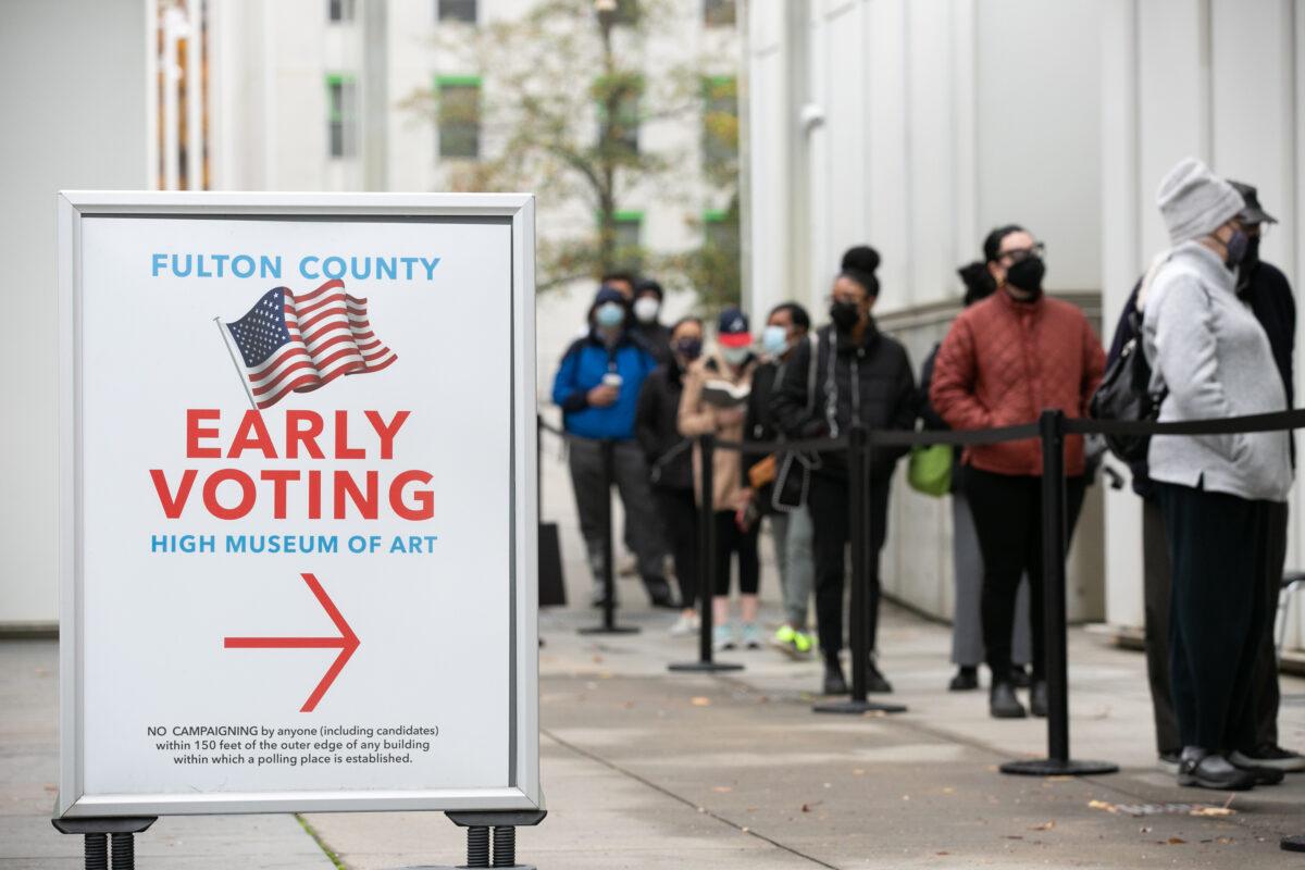Voters line up in Atlanta, Ga., on Dec. 14, 2020. (Jessica McGowan/Getty Images)