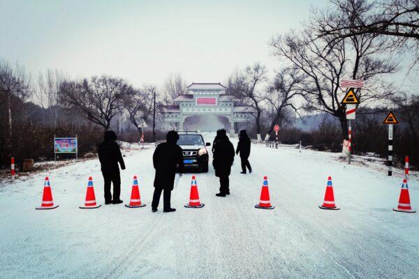 A car is banned from leaving Ang'angxi district as the province declares an "emergency state," in Qiqihar, in Heilongjiang Province, China, on Jan. 12, 2021. (STR/AFP via Getty Images)