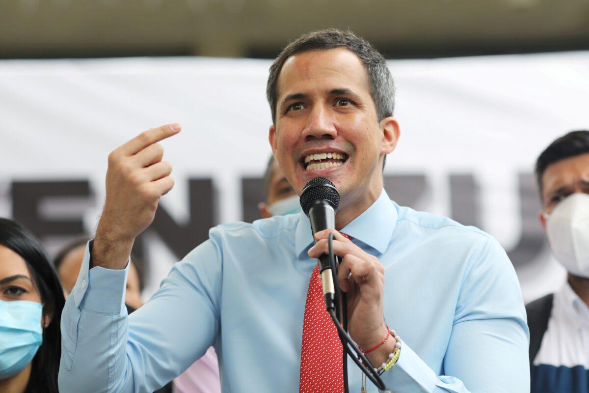 Opposition leader Juan Guaido speaks to the media during a news conference the day after the parliamentary election in Caracas, Venezuela, on Dec. 7, 2020. (Manaure Quintero/Reuters)