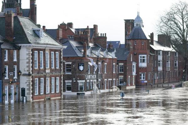 The River Ouse in York floods as rain and recent melting snow raise river levels in York, England, on Jan. 21, 2021. (Ian Forsyth/Getty Images)