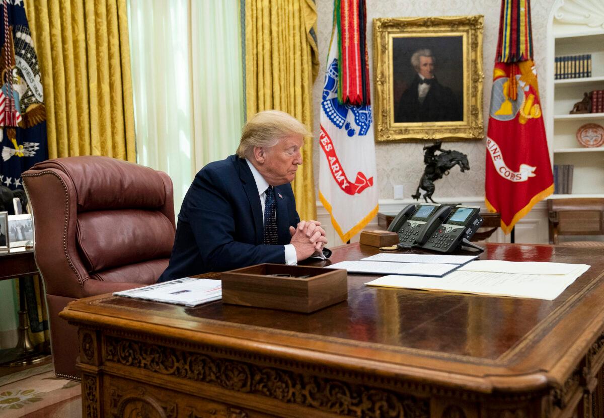 A portrait of America’s 7th president Andrew Jackson adorns the wall behind then President Donald Trump in the Oval Office, in Washington, on May 28, 2020. (Doug Mills/The New York Times)
