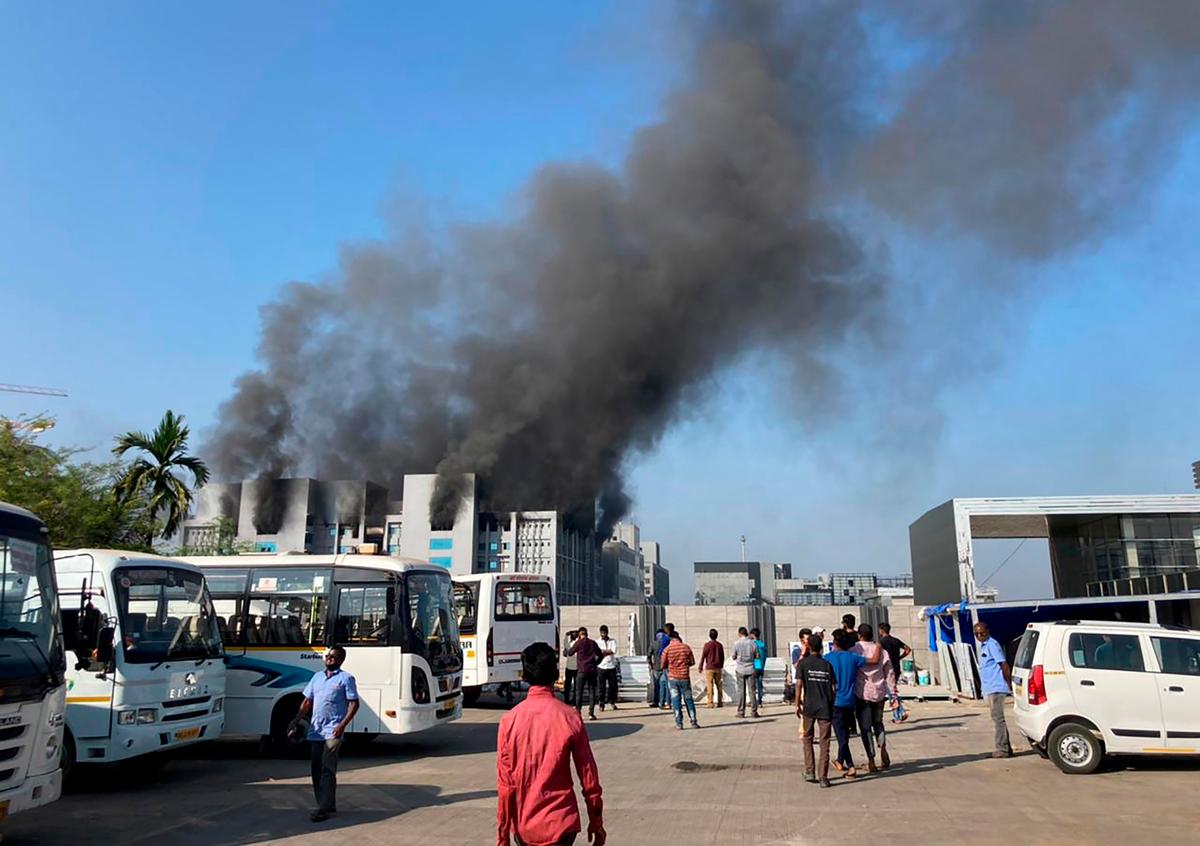 Smoke rises from a fire at the Serum Institute of India, the world's largest vaccine maker that is manufacturing the AstraZeneca/Oxford University coronavirus vaccine, in Pune, India, on Jan. 21, 2021. (Rafiq Maqbool/AP Photo)