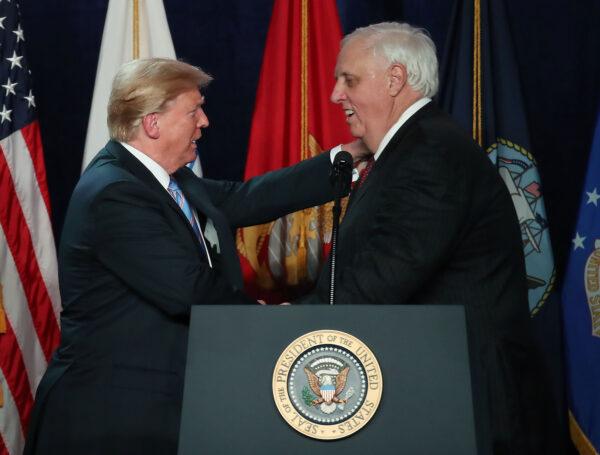President Donald Trump is introduced at an event by West Virginia Gov. Jim Justice (R), in White Sulphur Springs, W.Va., on June 3, 2018. (Mark Wilson/Getty Images)