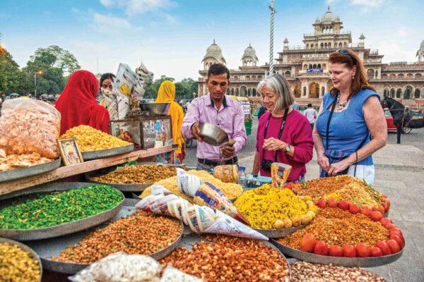 Members of an Overseas Adventure Travel tour group visit a spice market in India. (Courtesy of Grand Circle Corp)