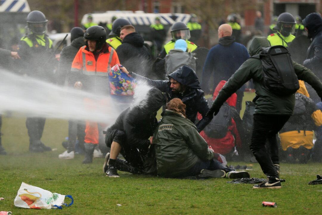 Dutch Police Detain 240 Nationwide as Anti-Lockdown Protests Turn Violent