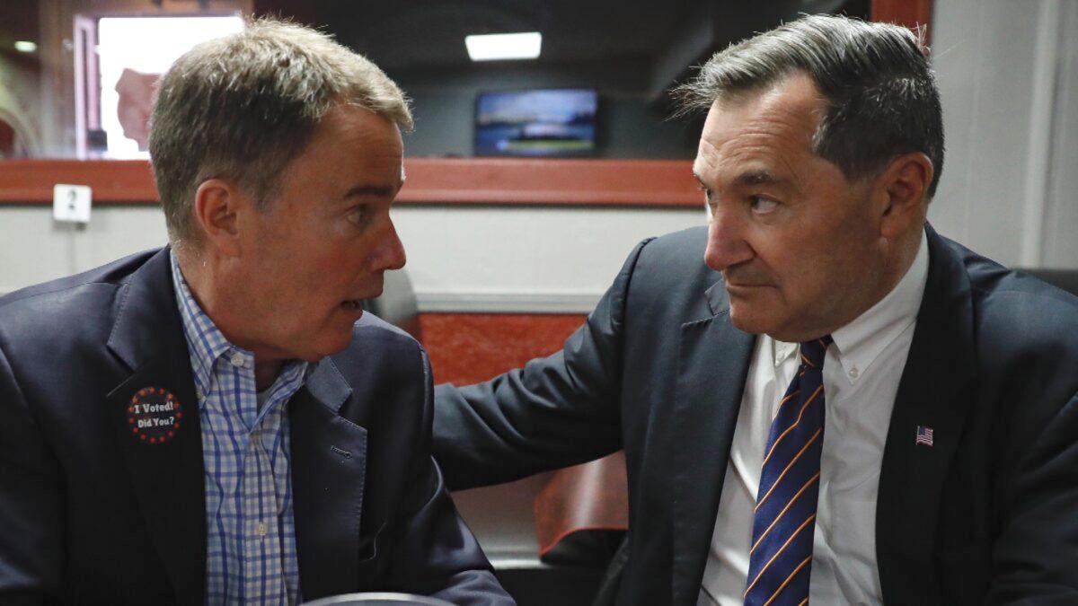  Sen. Joe Donnelly (D-IN) (R) speaks with Indianapolis Mayor Joe Hogsett at the Kountry Kitchen Restaurant on Nov. 6, 2018 in Indianapolis, Indiana. (Aaron P. Bernstein/Getty Images)