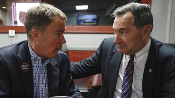 Sen. Joe Donnelly (D-IN) (R) speaks with Indianapolis Mayor Joe Hogsett at the Kountry Kitchen Restaurant on Nov. 6, 2018 in Indianapolis, Indiana. (Aaron P. Bernstein/Getty Images)