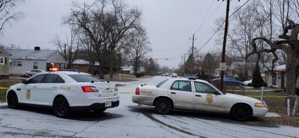 Indianapolis Metropolitan Police Department work the scene on Jan. 24, 2021 in Indianapolis where five people, including a pregnant woman, were shot to death. (Justin L. Mack/The Indianapolis Star via AP)