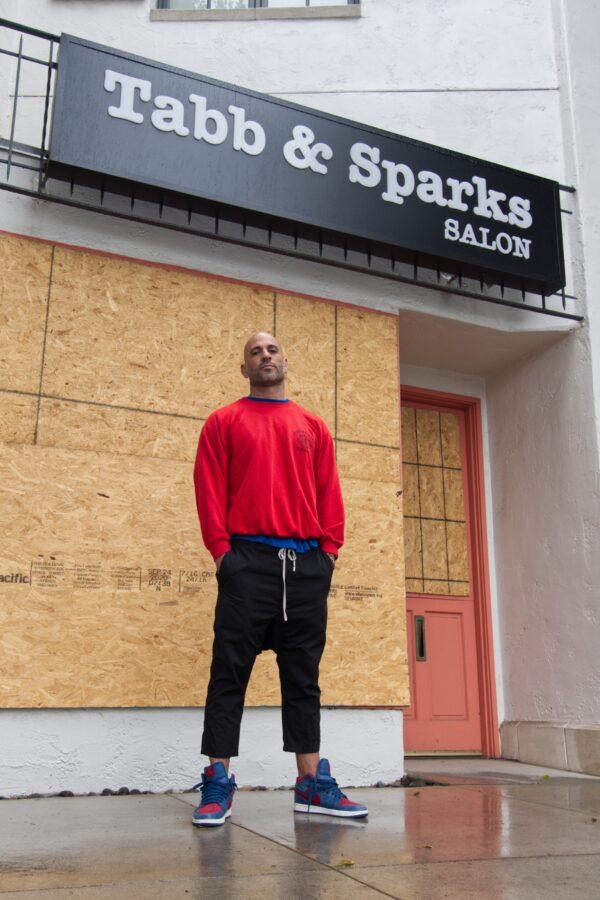 Michael Sparks stands in front of the salon he co-owns with Kristina Tabb, Tabb & Sparks, in Santa Monica, Los Angeles County, Calif., on Jan. 23, 2021. (William Sevilla)