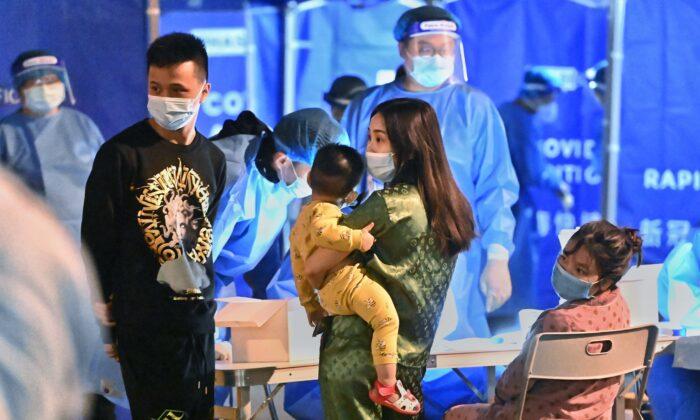 Hong Kong Locks Down One More Area and Mandates Overnight Virus Testing