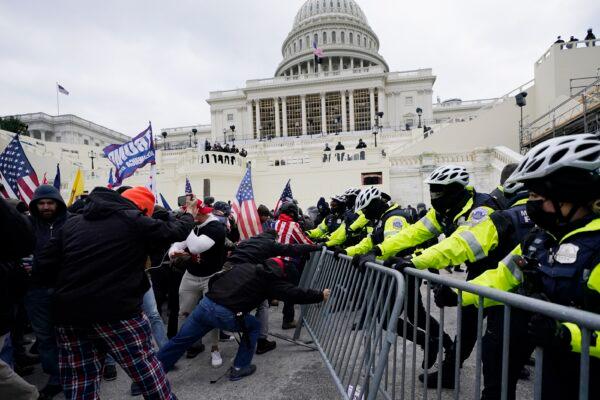 Protesters clash with police at the U.S. Capitol in Washington, D.C., on Jan. 6, 2021. (Julio Cortez/AP Photo)