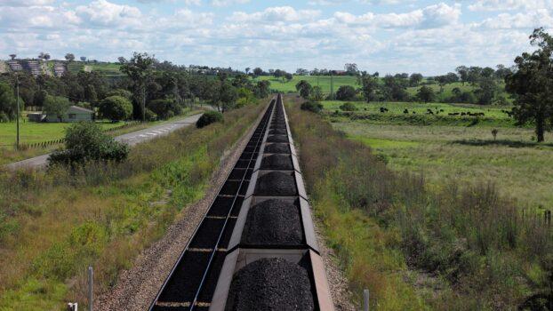 An Aurizon coal train travels through the countryside in Muswellbrook, north of Sydney, Australia, on April 9, 2017. (Jason Reed/Reuters)
